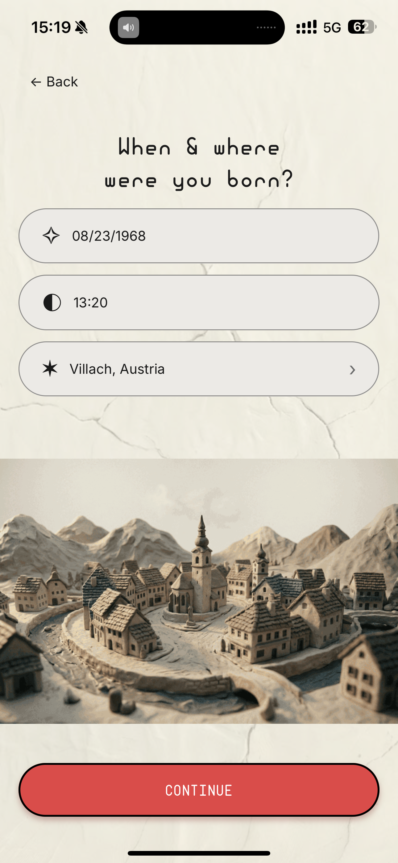 UNHINGED birth data entry screen with date time and location fields over miniature clay village
